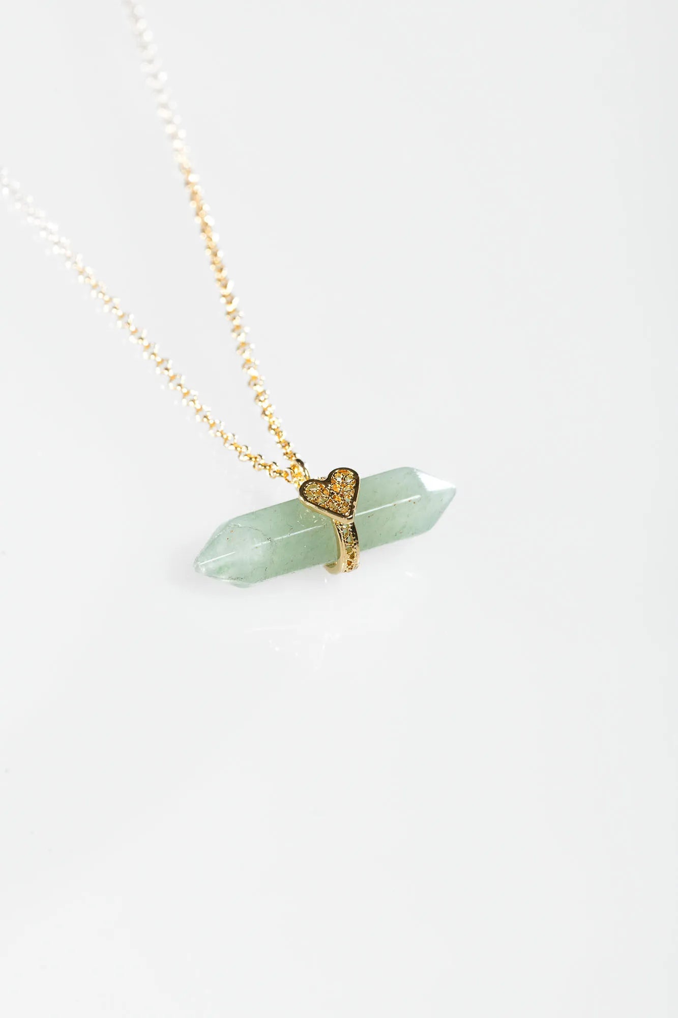 Holding Crystal Necklace