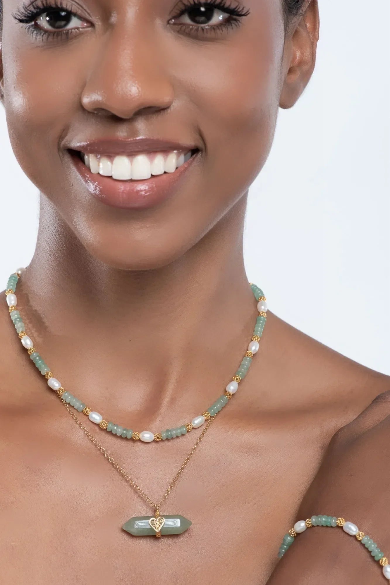 Holding Crystal Necklace