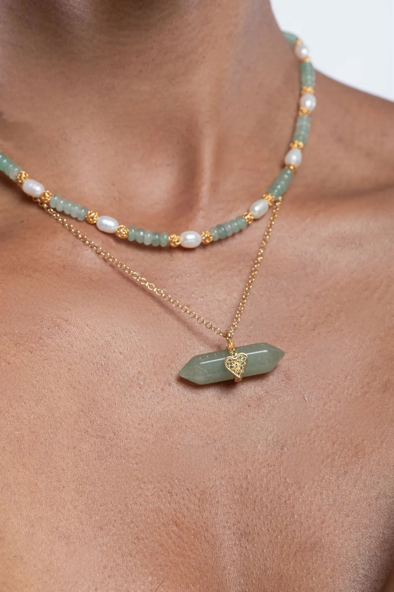 Holding Crystal Necklace