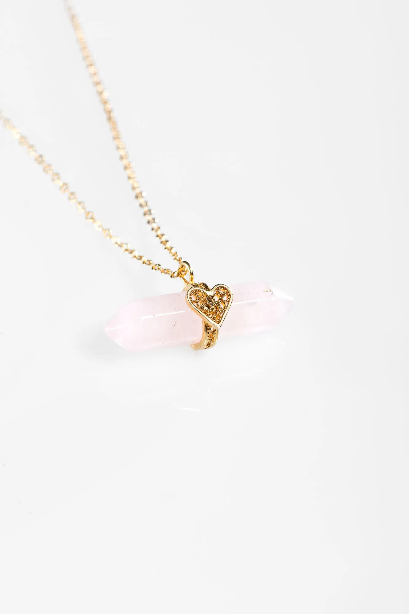 Holding Crystal Necklace