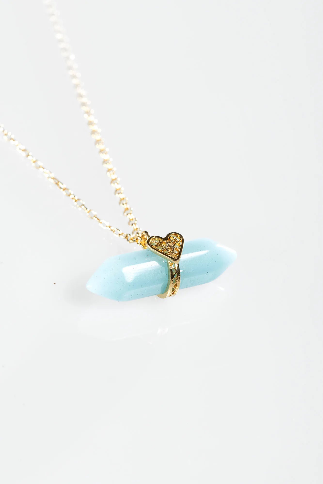 Holding Crystal Necklace